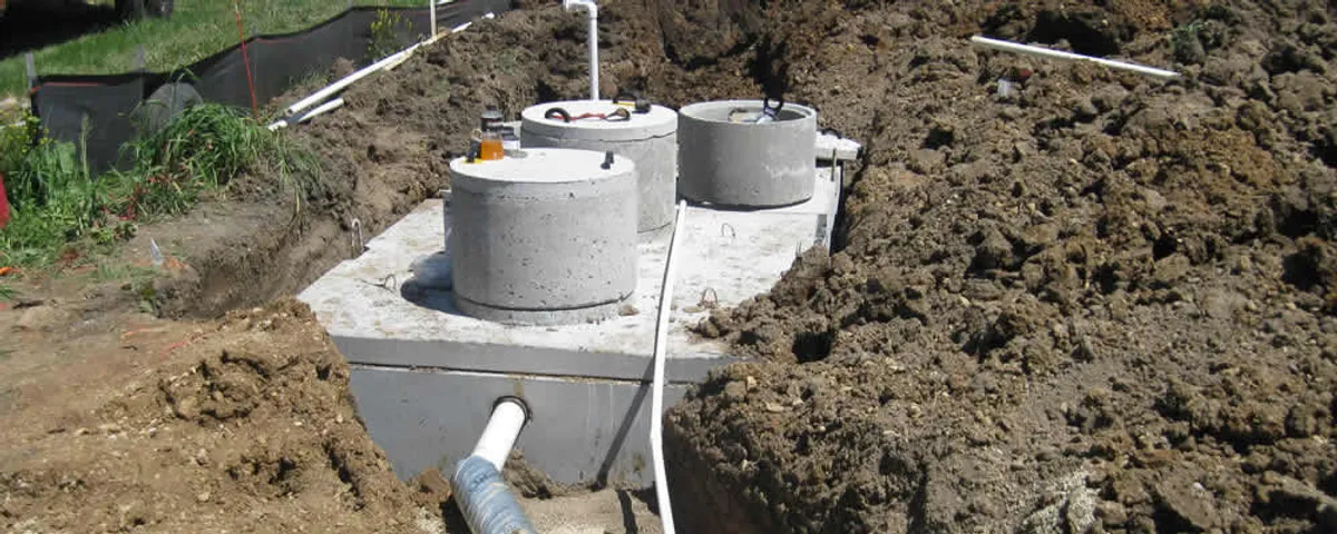 Septic system repair and installation site with tank access ports in Escondido, CA